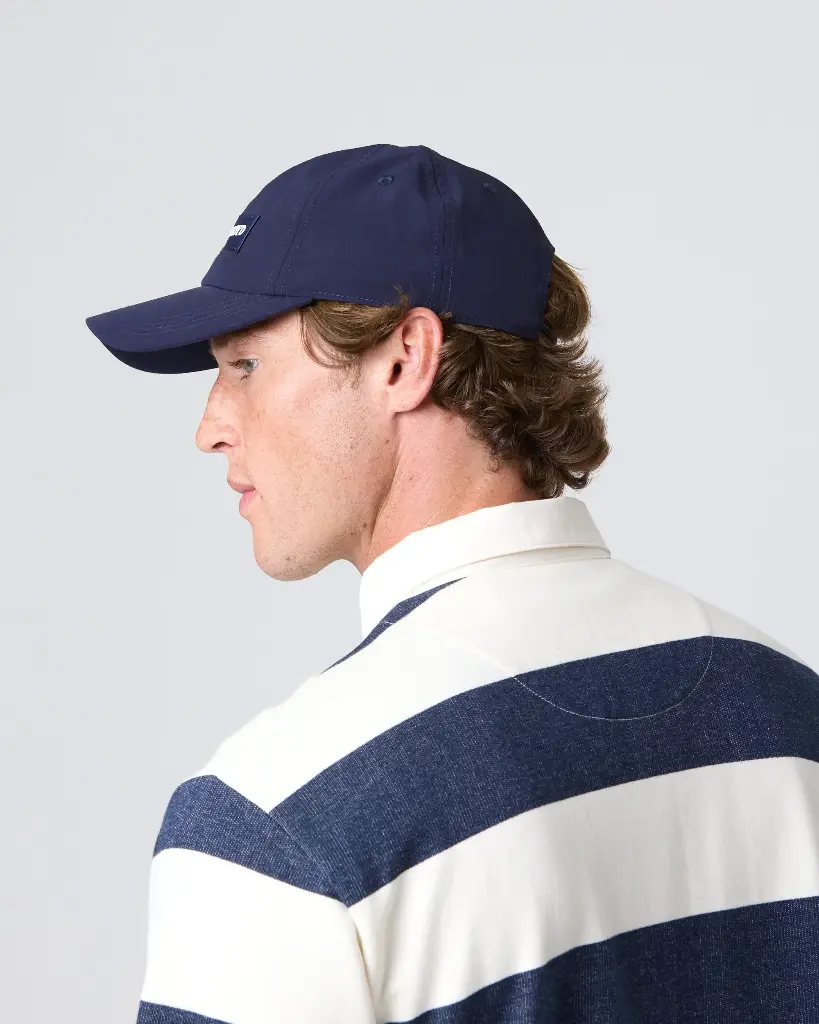 padstow-cap-dark-navy-model-side-henri-lloyd.webp