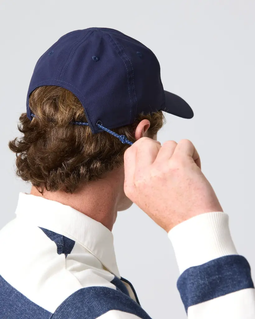 padstow-cap-dark-navy-model-back-henri-lloyd.webp